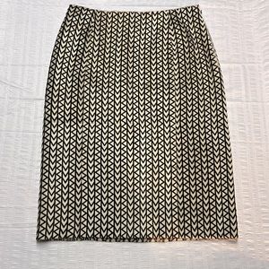 Michael Kors skirt textured leather (hair on hide like). Western theme?